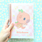 50 Page Sticker Keeper Book. Orange Capybara Reusable Sticker Album.