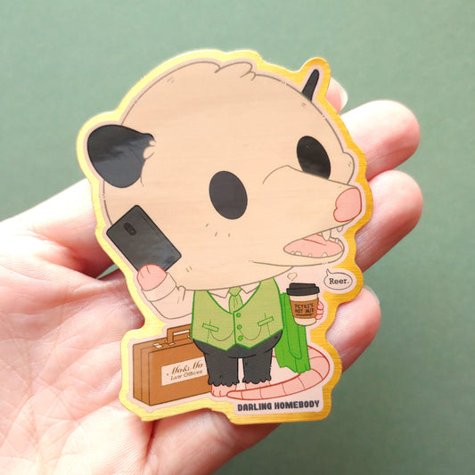 Opossum Lawyer 2023 Limited Edition Sticker. Brushed Gold Effect.